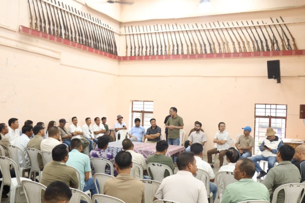 Officials during the a meeting in Mon on August 2.